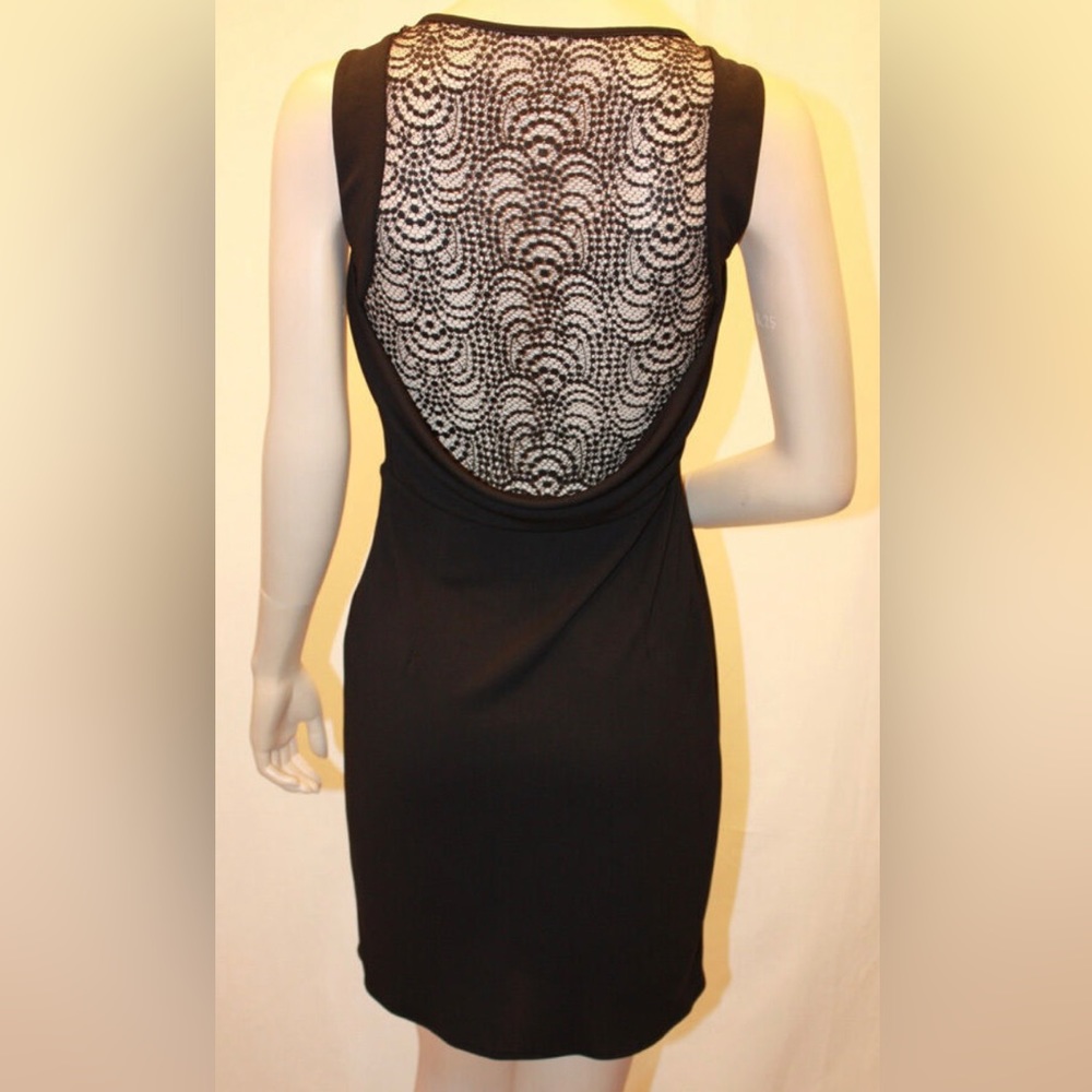 SALE!!! BcbgMaxAriza black jersey dress. Gorgeous lace back. Pleated side front.